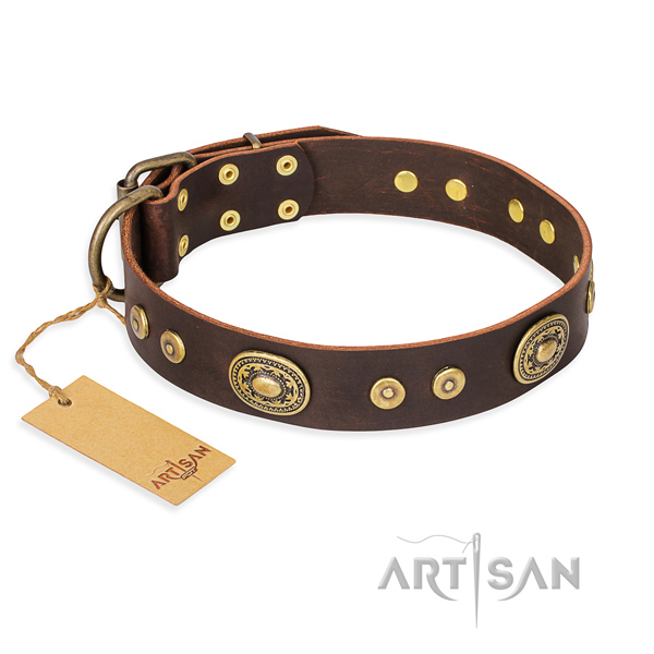 Leather dog collar made of gentle to touch material with rust resistant hardware